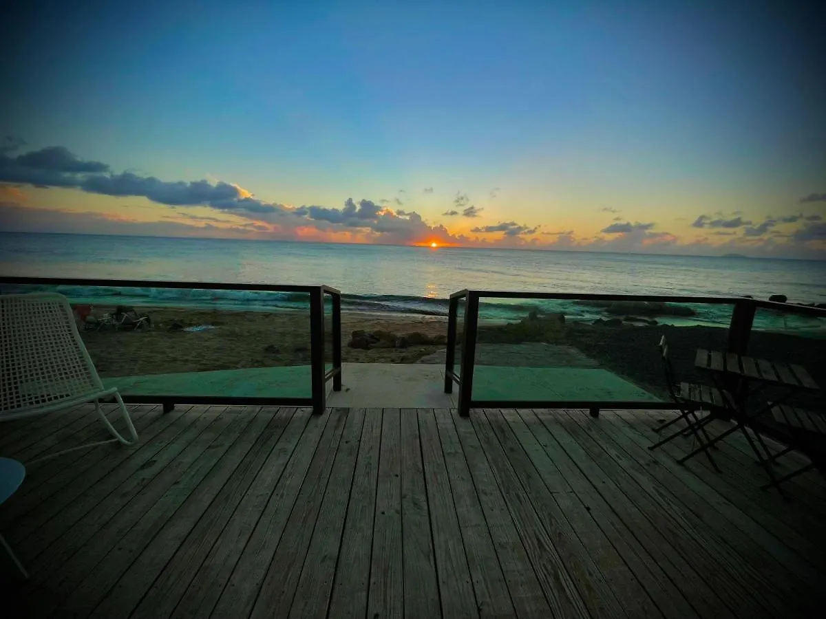 アパート Corcega Beachfront Suites リンコン プエルトリコ