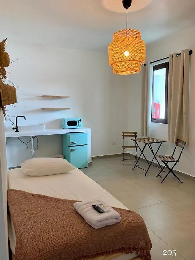 アパート Corcega Beachfront Suites リンコン プエルトリコ